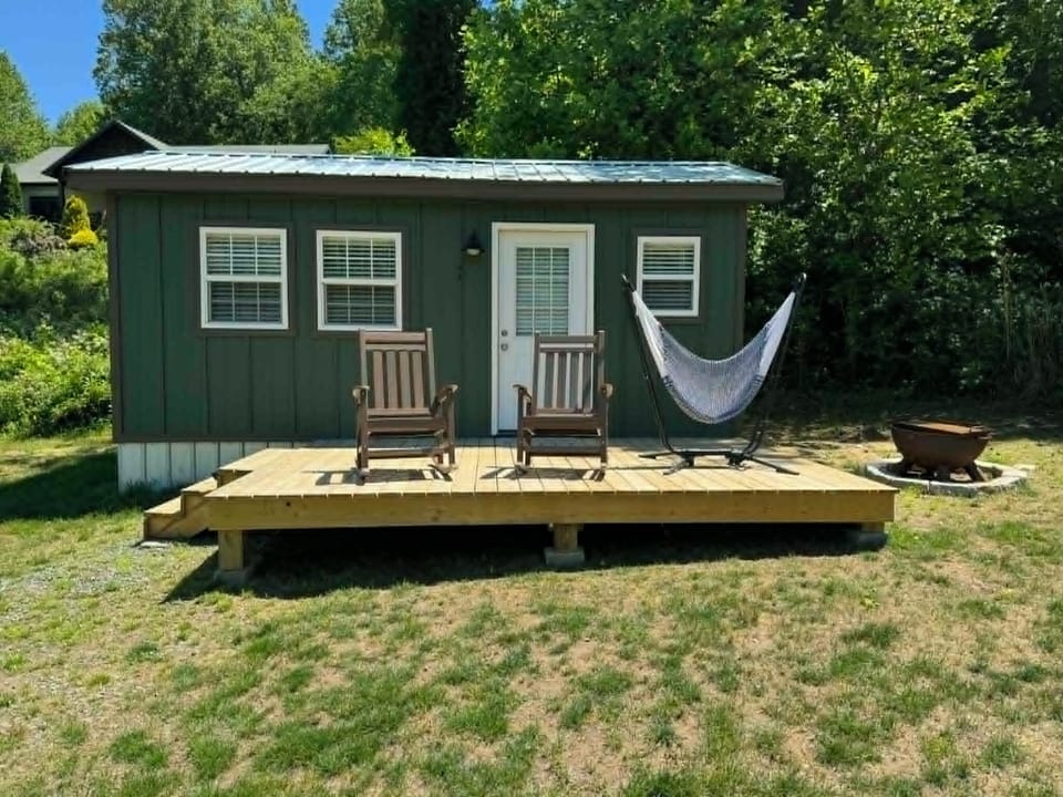 Enjoy beautiful Mountain and Pond views from the rocking chairs & hammock 