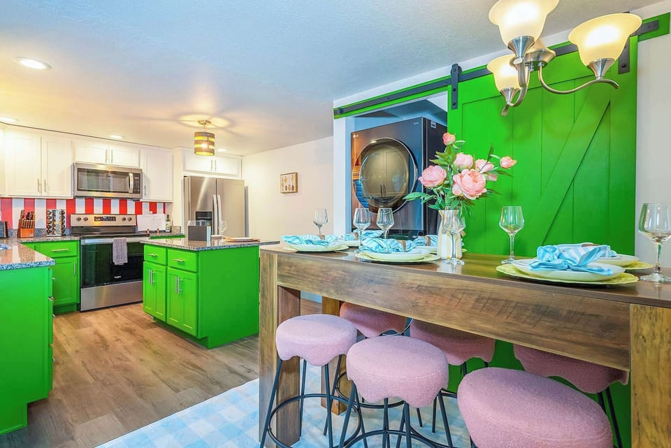 Enjoy the convenience of top-tier appliances and an in-unit laundry center, all wrapped in a playful, open-concept design that makes every meal feel like a celebration.