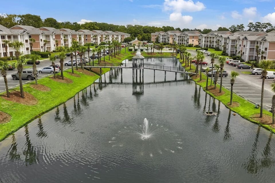 Enjoy the beautifully maintained grounds and gorgeous landscaping throughout this peaceful gated community. Lined with swaying palm trees, scenic ponds, fountains, and charming walking bridges, the neighborhood offers a serene resort-like atmosphere perfe