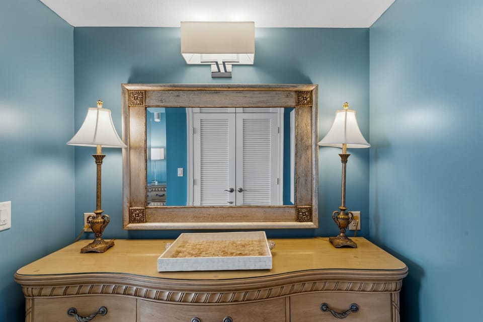 Additional mirrors in table in the hallway leading to master bathroom