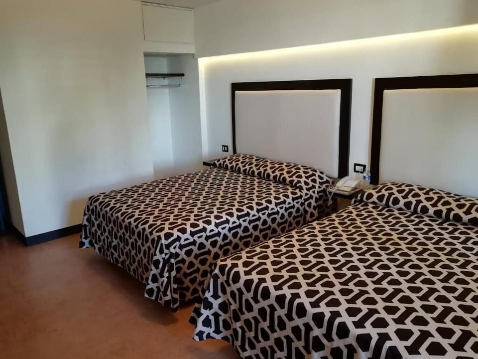 Share the space easily with two comfy beds and storage.