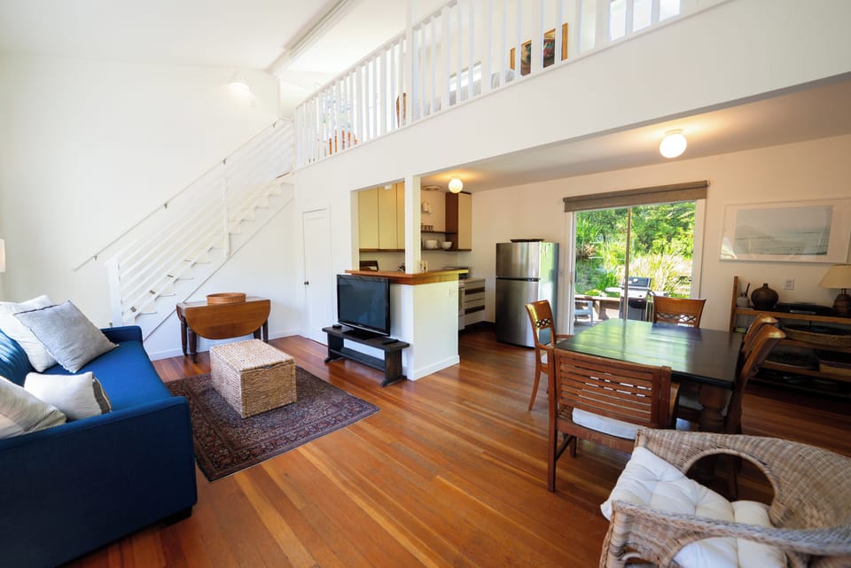 Stairs to the loft bedroom shown