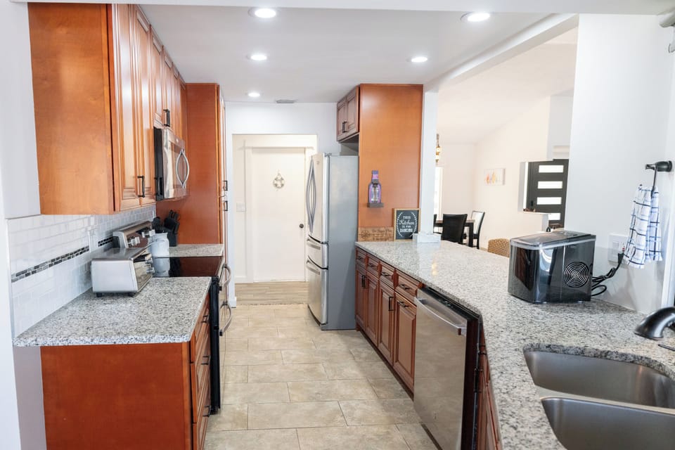 Plenty of counter space & full stainless appliances for easy cooking.

