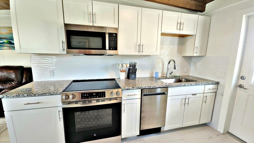 new kitchen, oven, stovetop, dishwasher microwave 