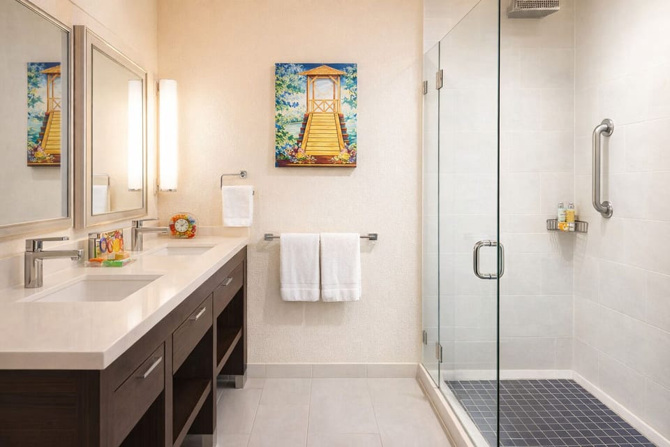 Refresh in a sleek glass shower with spa-like finishes.