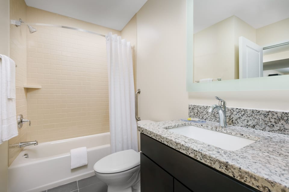 Refresh after adventures with a bright, spotless tub-shower combo.