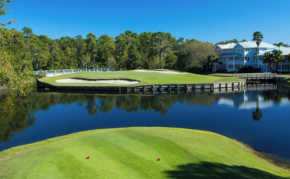 Escape to serene greens and water views nearby.