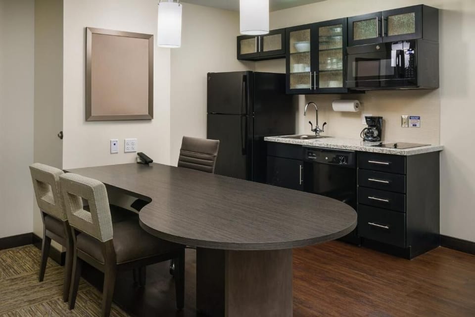 Cook light meals easily with a sleek, practical kitchenette.