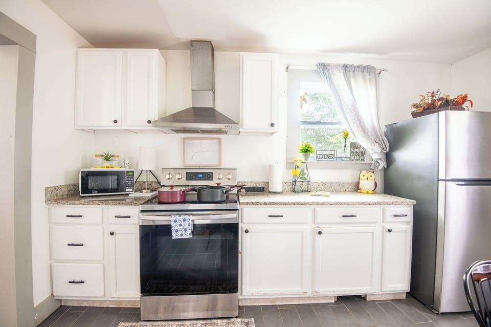 Whip up breakfast before heading out or gather everyone for dinner after a day of exploring. This fully stocked kitchen has everything you need to feel right at home.