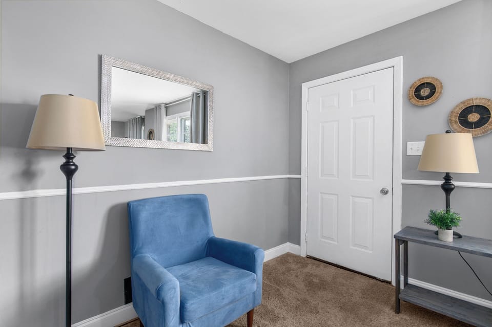 Step through the door and straight into comfort—the entry opens right into the living space, making arrivals feel easy, welcoming, and instantly like home.