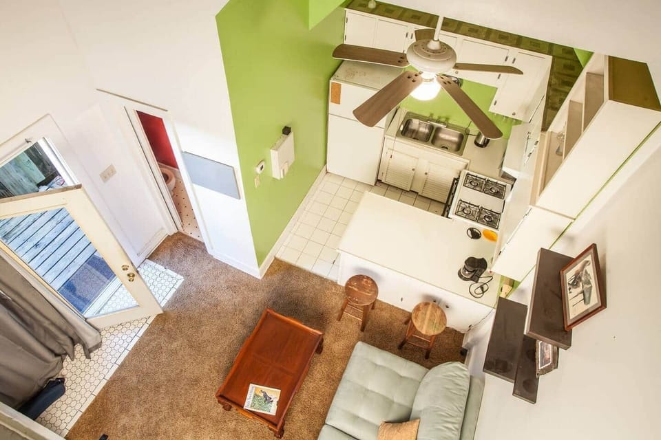 looking downstairs from second floor hallway 