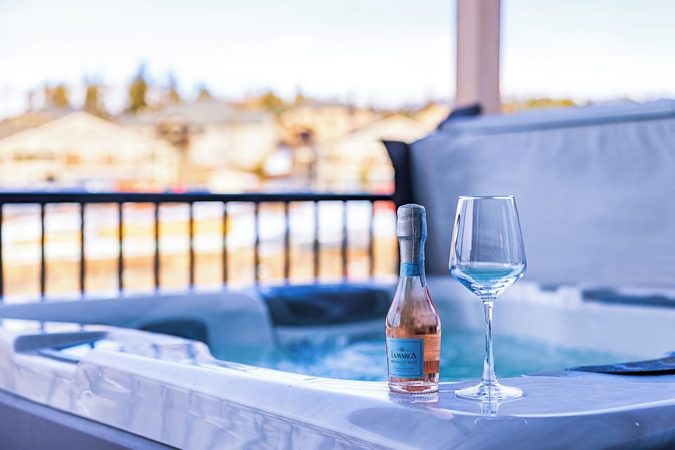 Hot Tub Retreat: Unwind with bubbles and bubbly while savoring the mountain air!