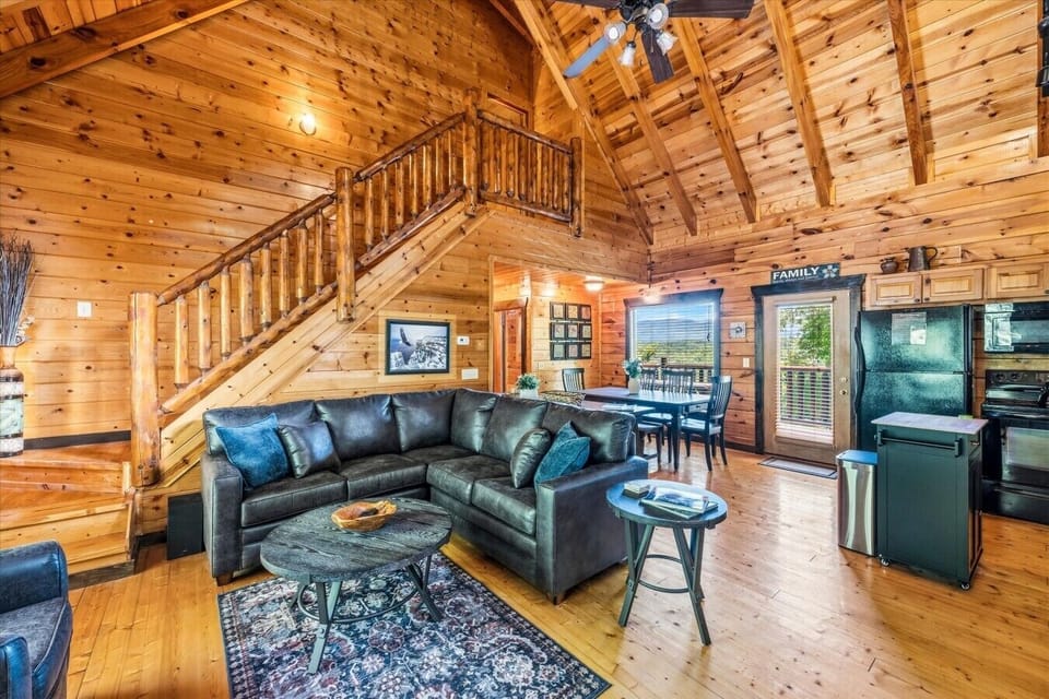 Relax on the comfortable sectional sofa and enjoy the warm mountain-cabin atmosphere after a day of exploring.