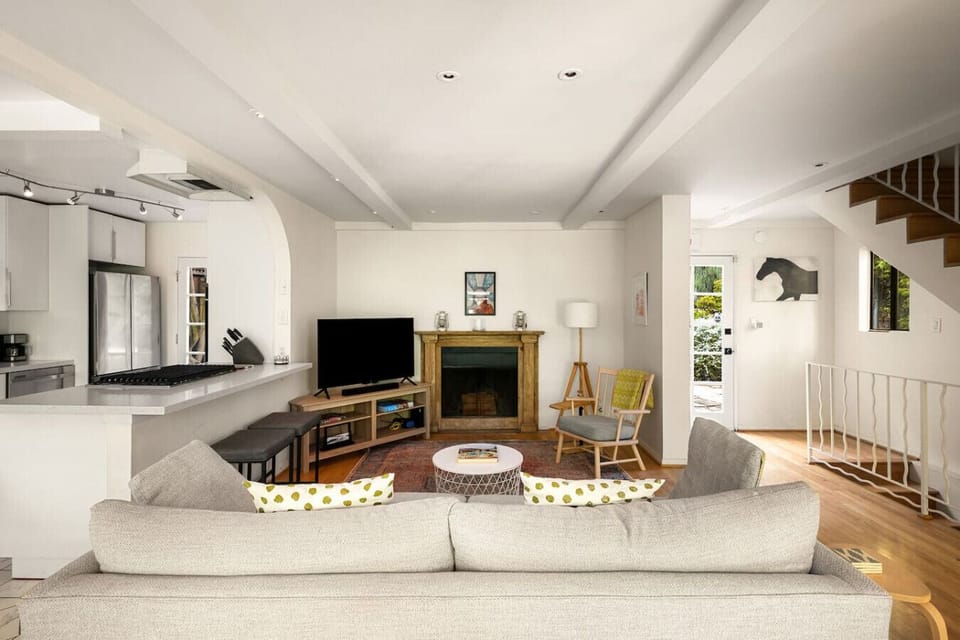 Sunlit living area designed for comfort, featuring scenic views and a cozy, elevated feel.