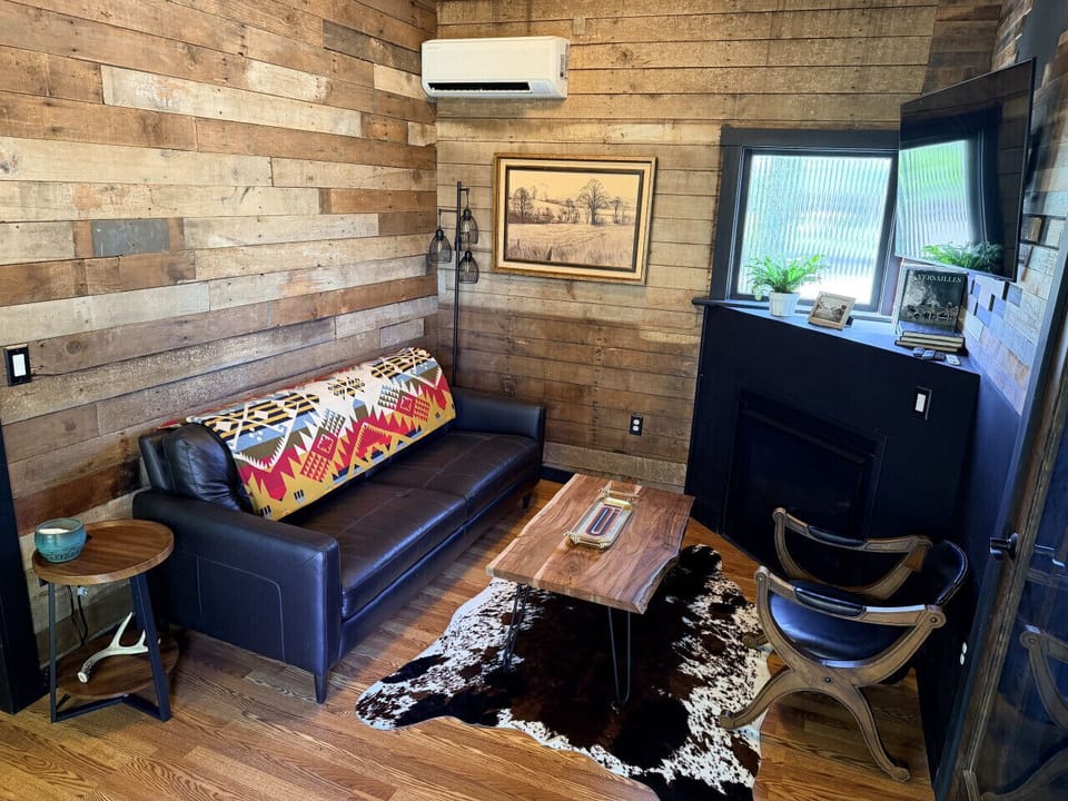 Living Room with cozy fireplace and comfy couch