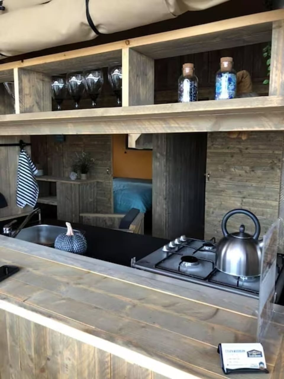 Cook simple meals easily in the compact, well-stocked kitchenette.