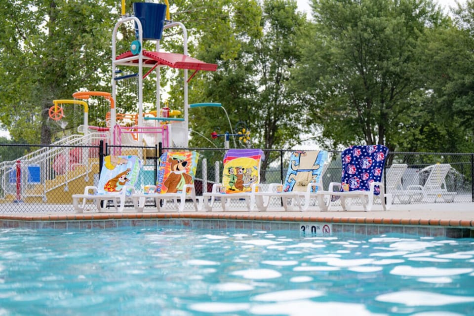 Soak up sunshine beside the playful splash zone.