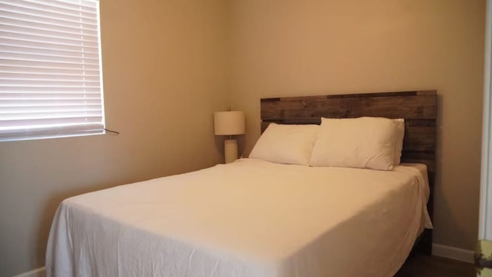 Unwind in crisp linens for a peaceful night’s sleep.