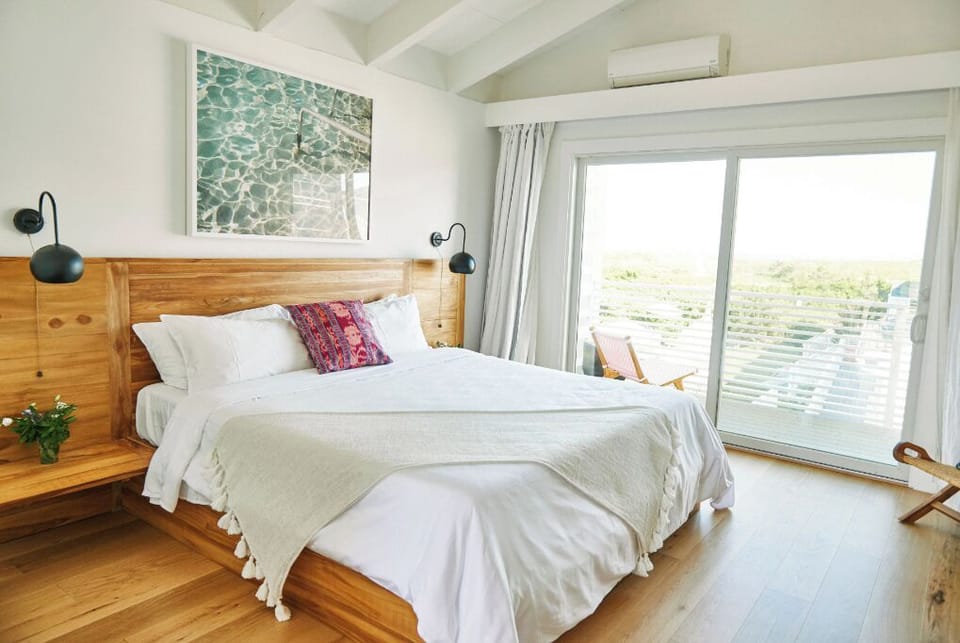 Arrive, exhale, and enjoy a bright king room with views.