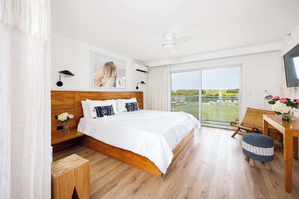 Arrive, exhale, and enjoy a bright king room with views.