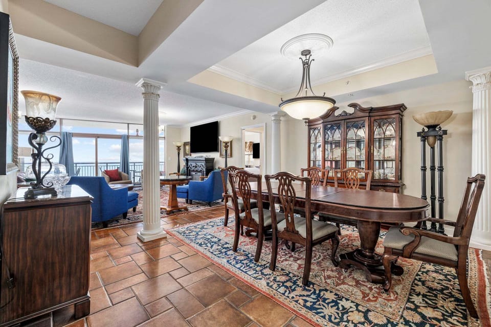 The open concept shows how spacious this condo is for your large goup.