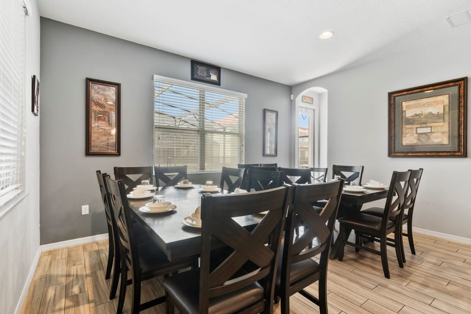 Dining area w/ seating for the whole group, perfect for shared meals & game night snacks
