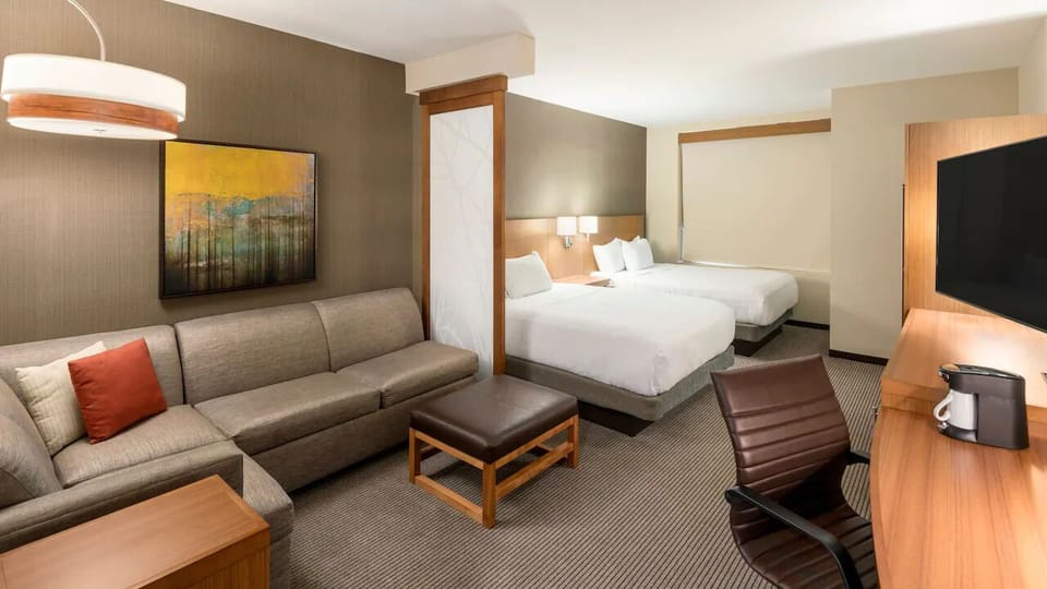 Unwind in a spacious suite with two plush beds.