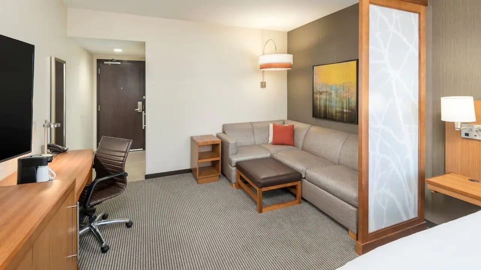 Recharge in a spacious suite designed for easy, comfortable stays.