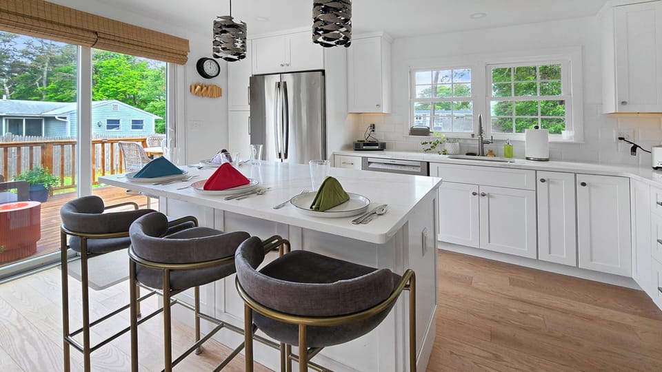 Dine at the breakfast bar or at the table on the deck