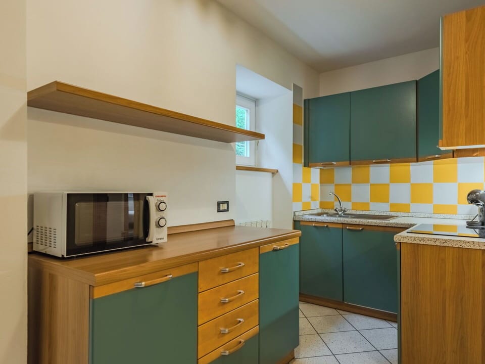 Kitchen, Interior Design, Wood, Flooring, Countertop, Major Appliance, Cabinetry, Kitchen Appliance, Ceiling, Floor