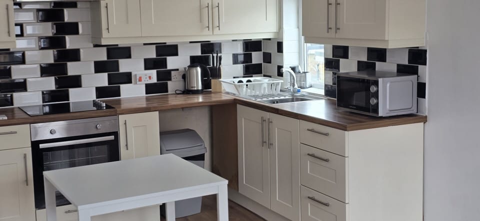 Open-plan kitchen with dining facilities