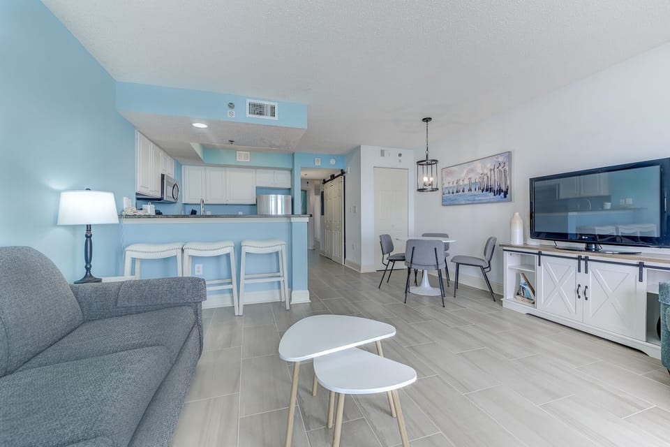 Open, inviting living space with natural light and room to relax.