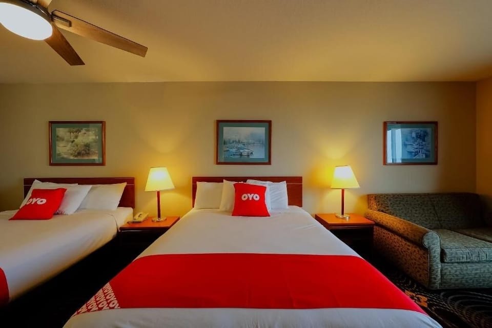 Stretch out in a spacious room with desk and TV.