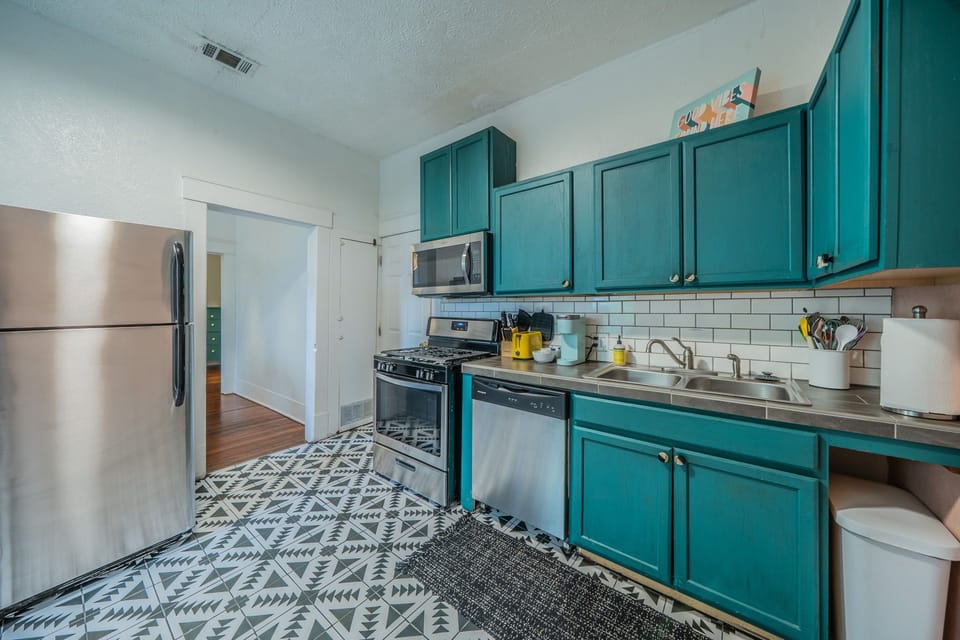 Cook in style with vibrant decor and high-end stainless appliances.