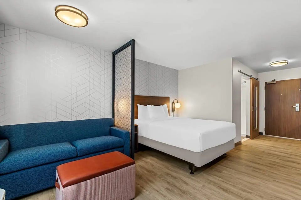 Kick back on the sofa, then retreat to the bed.