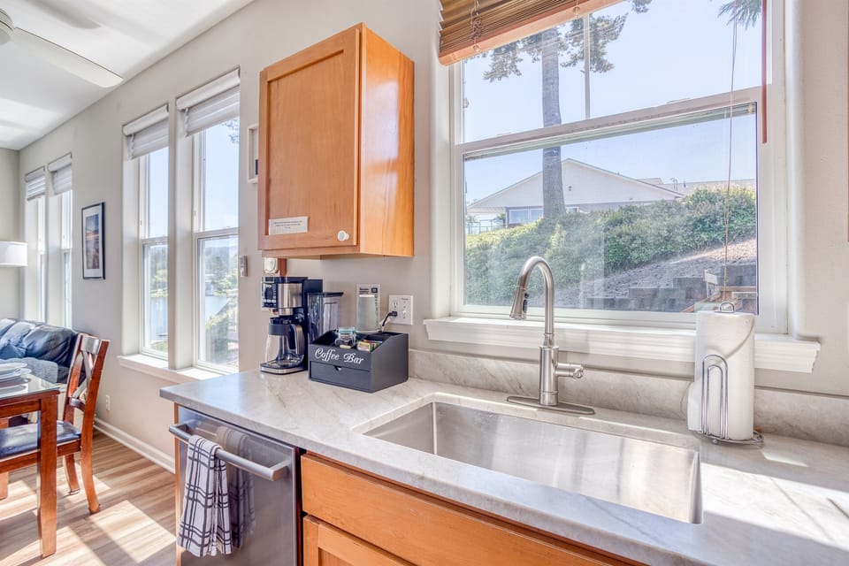 Kitchen: Bright and inviting space for culinary adventures, includes a coffee bar!