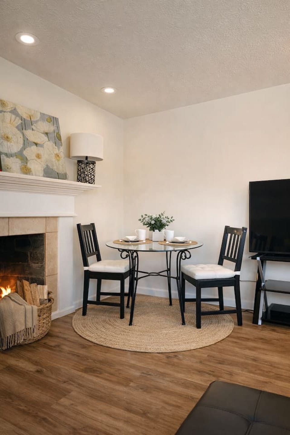 Living room with bistro table and smart tv