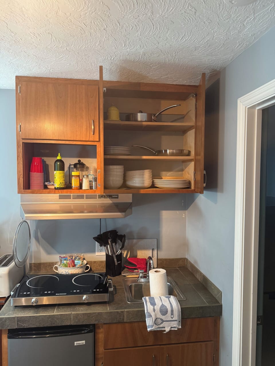 Kitchenette dishes and pans