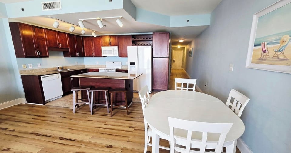 Kitchen table and island seating.