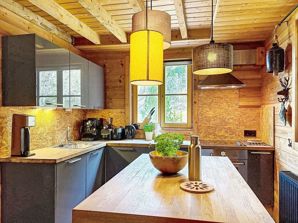 Furniture, Interior Design, Countertop, Kitchen, Flooring, Light Fixture, Wood, Ceiling, Home, Floor