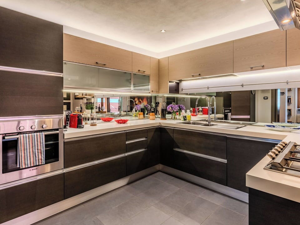 Kitchen, Countertop, Interior Design, Kitchen Appliance, Major Appliance, Flooring, Cabinetry, Ceiling, Furniture, Lighting