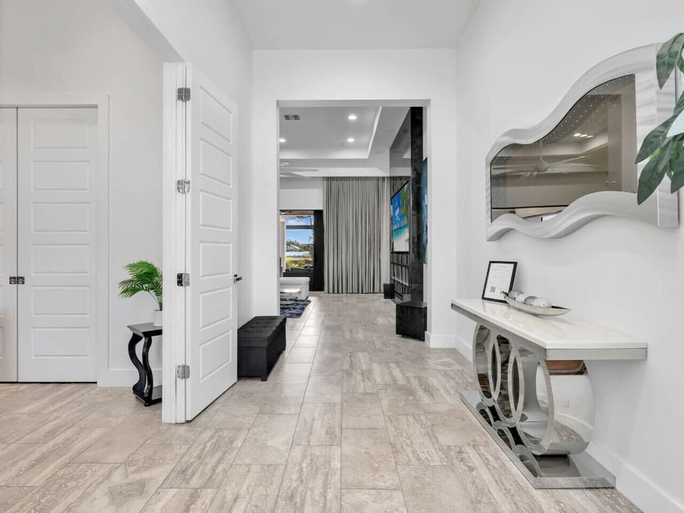 A clean, spacious entry welcomes you in with modern finishes and an easy flow into the main living area.