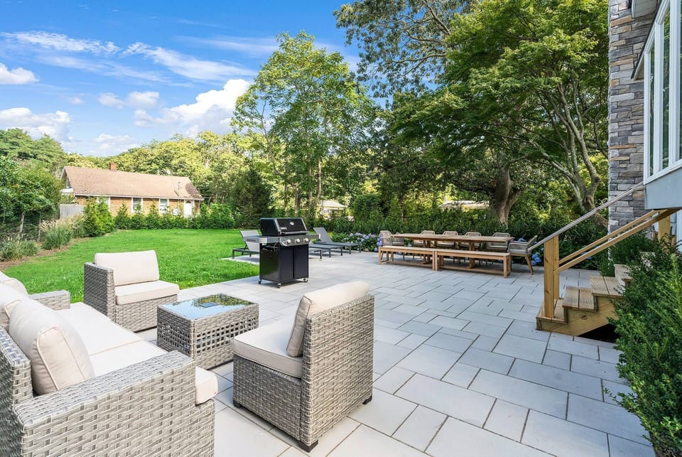 800 sq ft patio, with teak dining table for 12, gas weber grill + lounge area