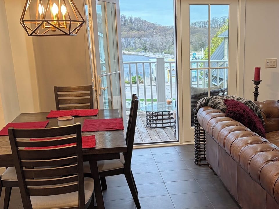 Walk out to your own private wrap around balcony overlooking the water and pool