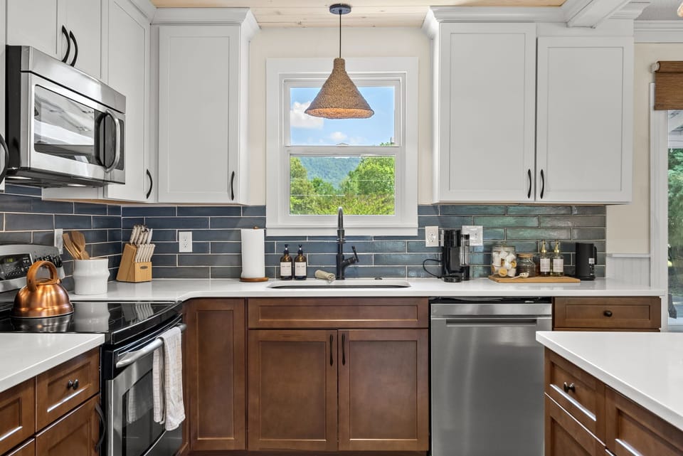 Our newly renovated kitchen, equipped with all the supplies you need to cook and host a meal.
