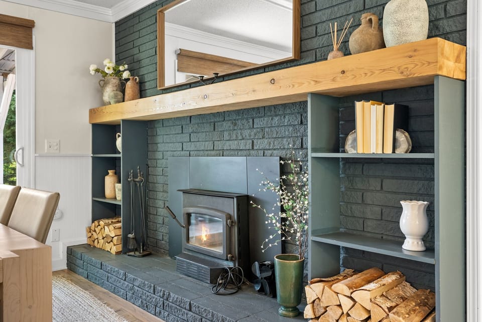 The fireplace, adjacent to our dining table. Fireplace works; please only operate in winter months and use cation. Adult supervision required. 
