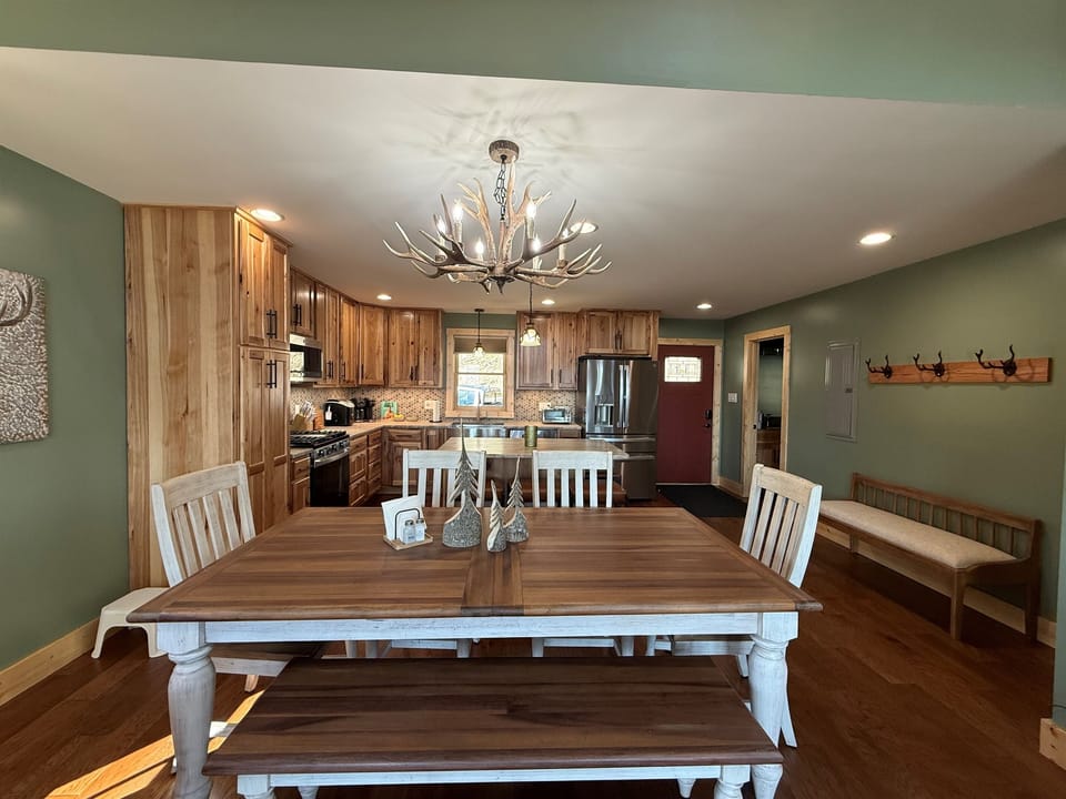 Dining Table w/ sitting for 6. 