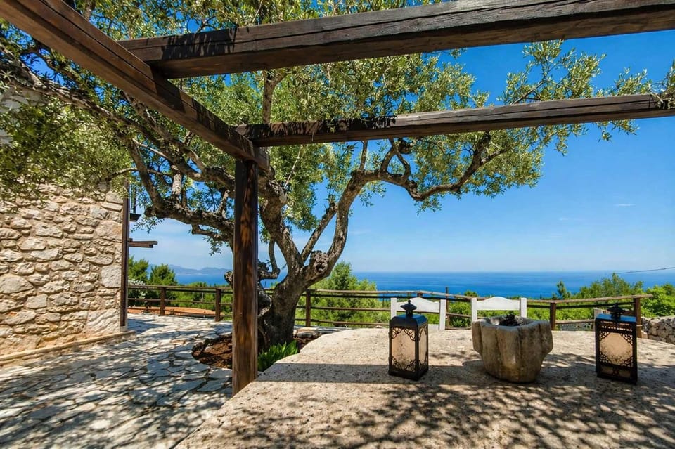 Shaded Outdoor Dining Area with Sea View
