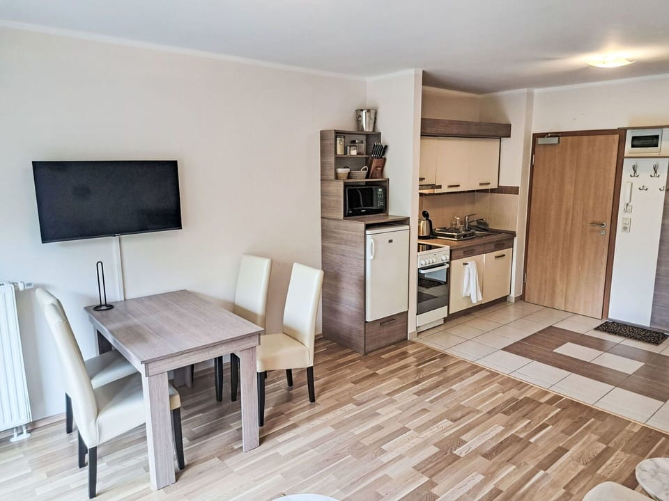 Wood, Furniture, Floor, Flooring, Interior Design, Apartment, Room, Wood Stain, Hardwood, Chair