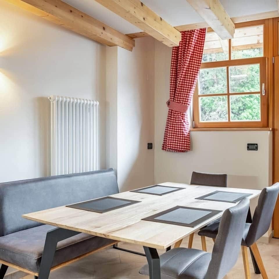 The large kitchen table seats up to 6 people